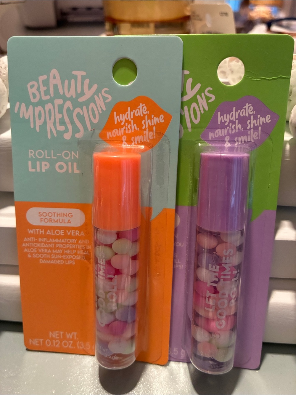 Impressions Roll-On Lip Oil — Orange & Purple Caps discounted shipping